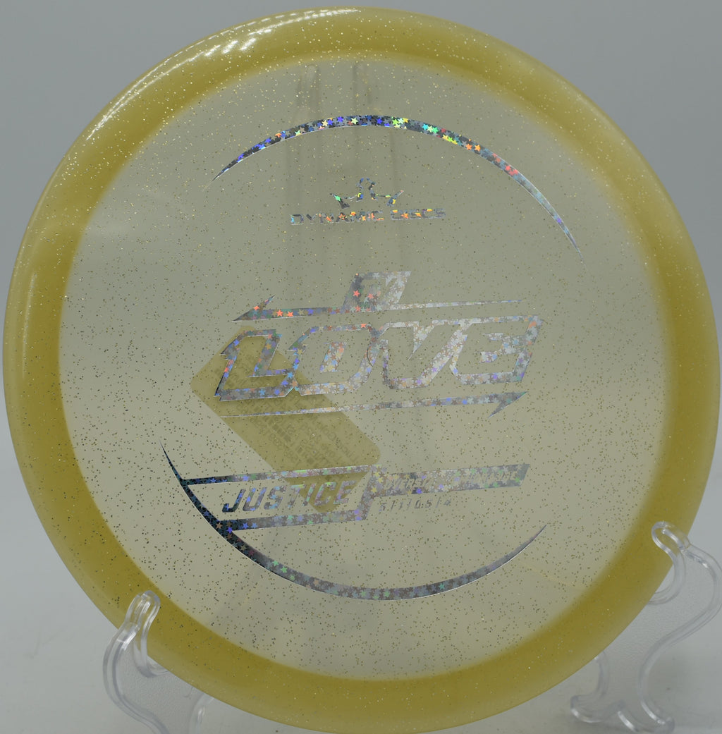 Dynamic Discs Lucid Gold Metal Flake Justice battling a headwind at Whispering Falls DGC in Greencastle, Pennsylvania.

