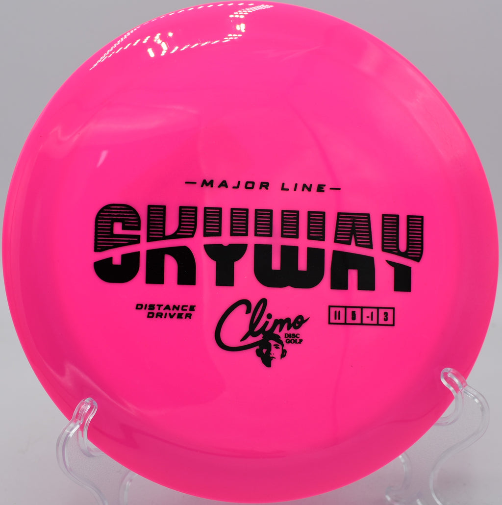 Climo Discs Skyway gliding flat across open terrain at Iron Hill DGC in Newark, Delaware.


