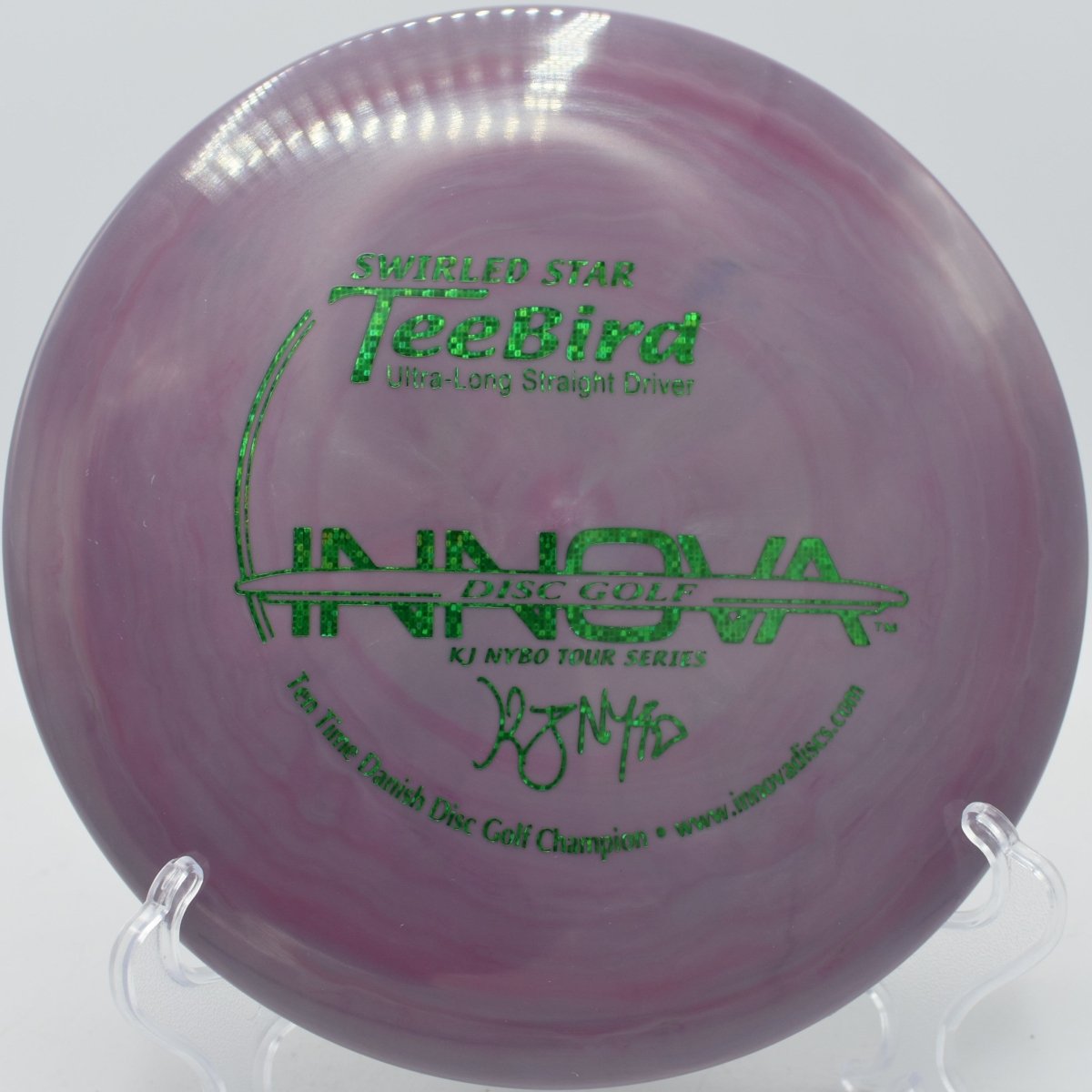 KJ Nybo Swirly Star TeeBird fairway driver pushing a dead-straight tunnel shot with a clean finish at Renny Gold Disc Golf Park in Manchester, Vermont, delivering dependable stability, controlled glide, and elite fairway accuracy for competitive disc golf play