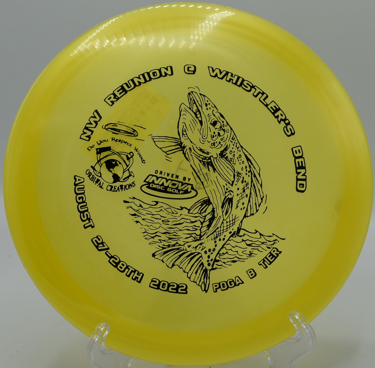Luster TeeBird fading gently toward the basket on Hole 9 at Highbridge Gold Disc Golf Course, Highbridge, Wisconsin.






