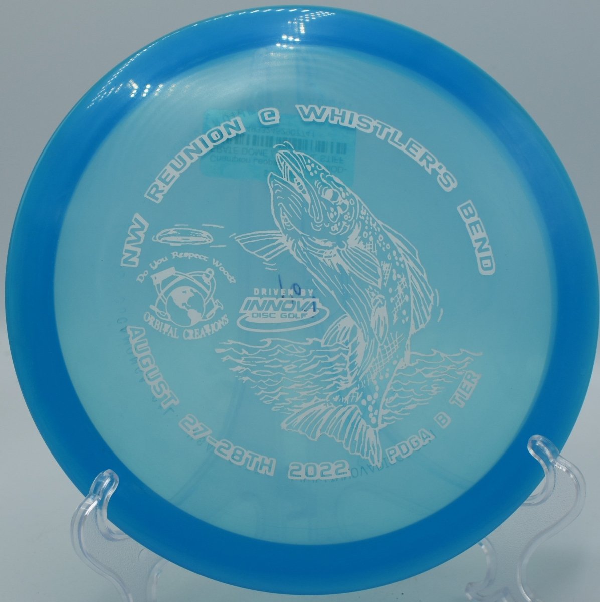 Innova Champion Leopard driver gliding through wooded gap on a clean release at Indian Camp Creek Disc Golf Course in Foristell, Missouri