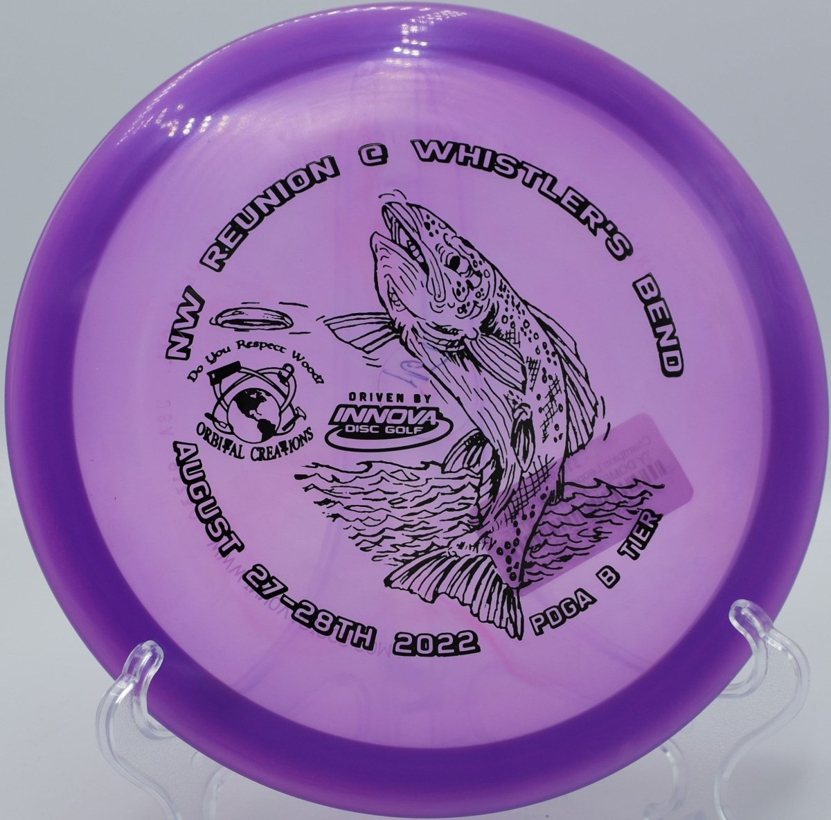Champion Leopard fairway driver executing a controlled anhyzer line at Searight Park Disc Golf Course in Austin, Texas