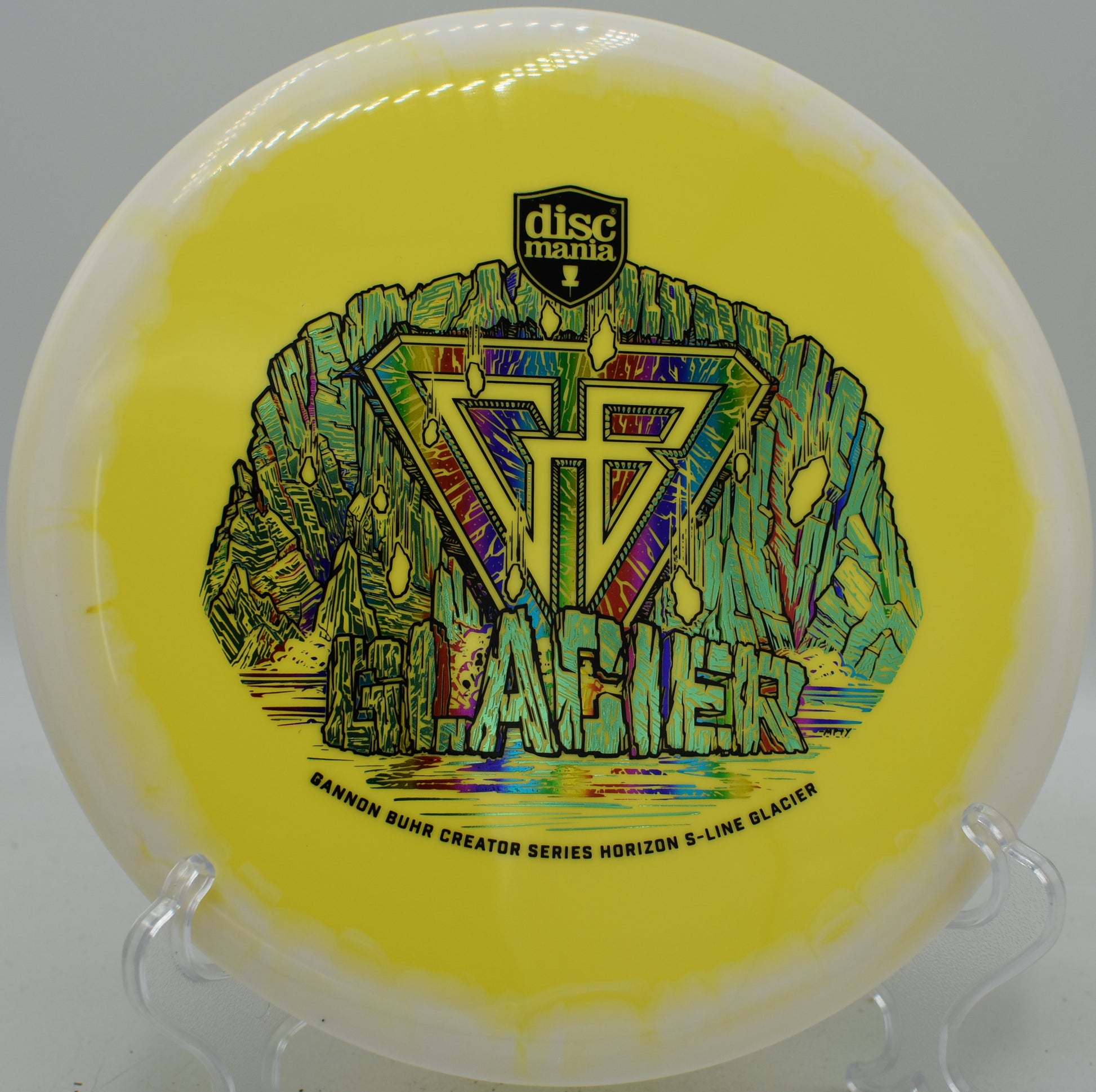 Discmania Glacier triple stamp version floating dead straight toward the basket at Eagles Crossing.

