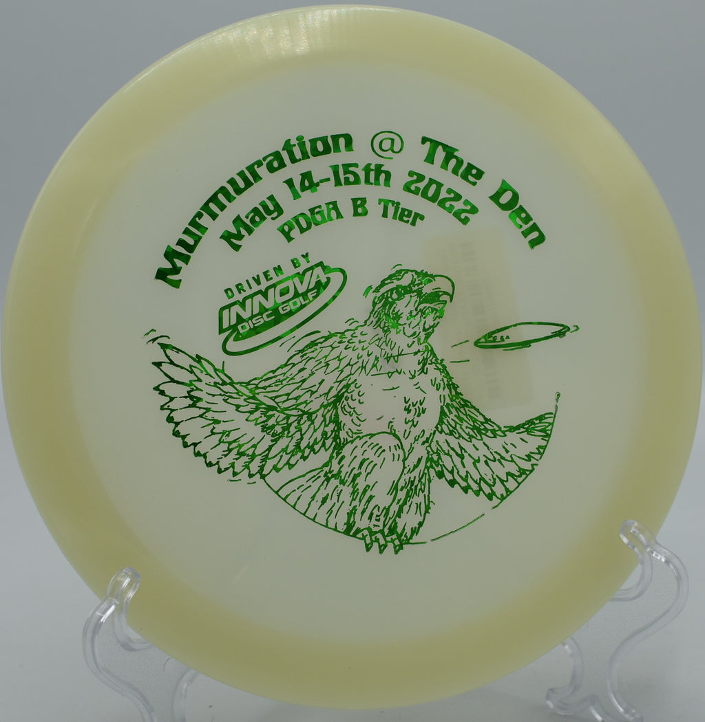 Innova Glow Champion Firebird fading hard toward the basket on Hole 14 at Paw Paw Tunnel Disc Golf Course, Oldtown, Maryland.
