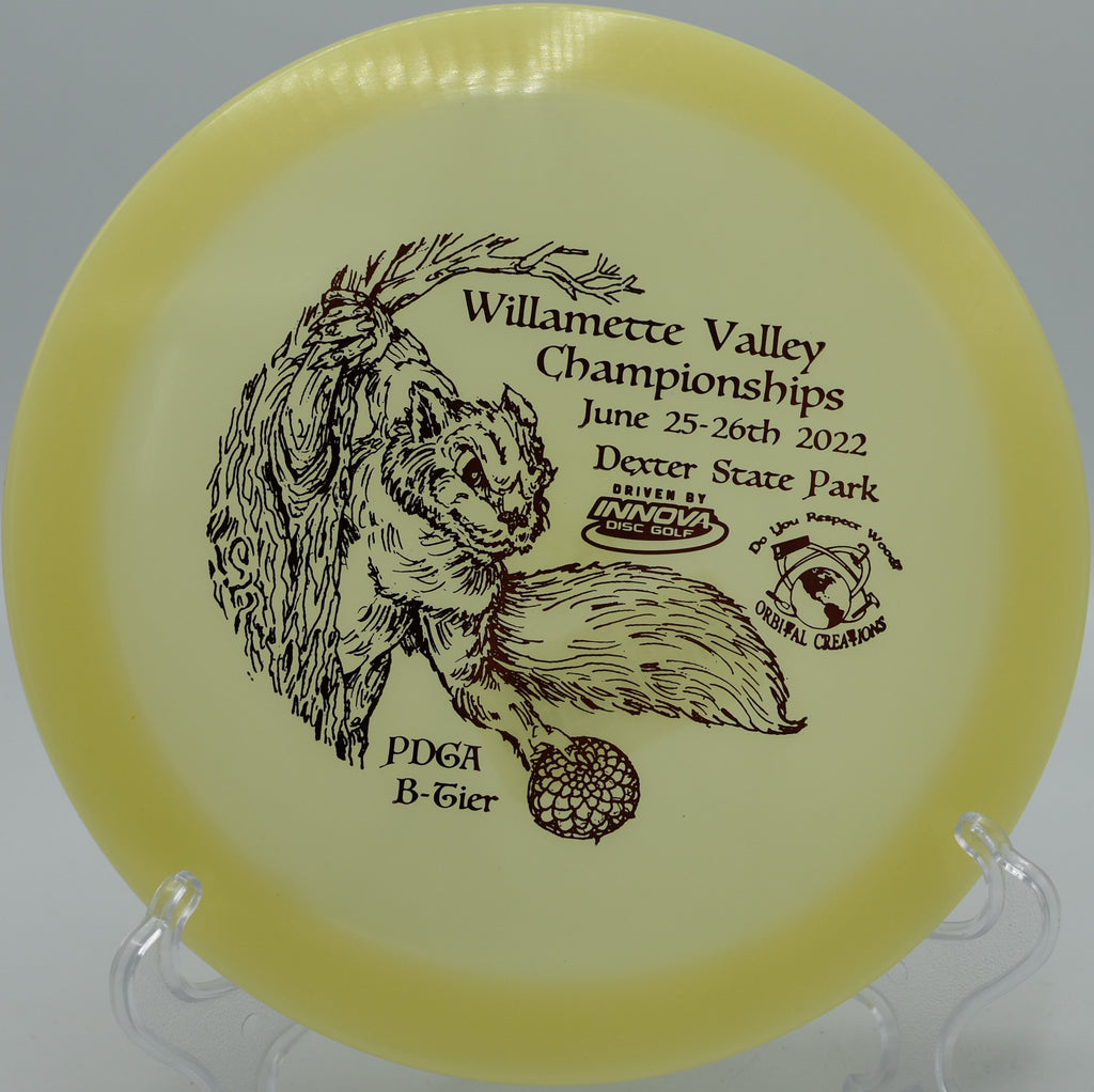 Glow Champion Firebird carving a steep hyzer on Hole 6 at DeLaveaga Disc Golf Course, Santa Cruz, California.
