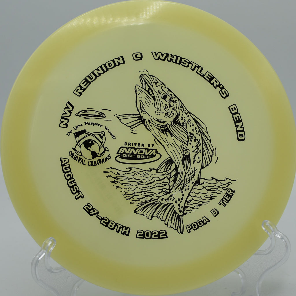 Glow Champion Firebird holding an aggressive flex shot on Hole 6 at Bald Mountain Disc Golf Course, Lake Orion, Michigan.
