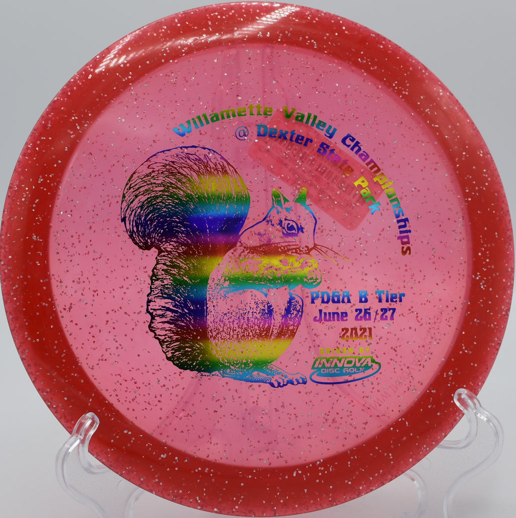 Innova Champion Metalflake Roadrunner gliding effortlessly on a hyzer flip at Hole 12 at Circle R Ranch Disc Golf Course, Wimberley, Texas.
