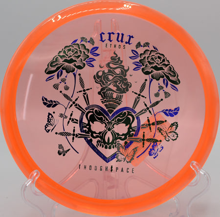 Thought Space Athletics Ethos Crux floating gently toward the basket on Hole 8 at Bucksnort Disc Golf Course, Pine, Colorado.
