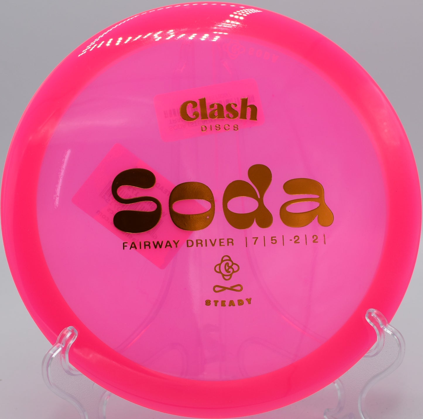 Clash Discs Steady Soda fading gently toward the green on Hole 17 at Trophy Club Disc Golf Course, Trophy Club, Texas.
