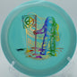 Infinite Discs C-Blend Glow Aztec landing near the pin on Hole 14 at Rock Ridge Disc Golf Course, Pittsboro, North Carolina.
