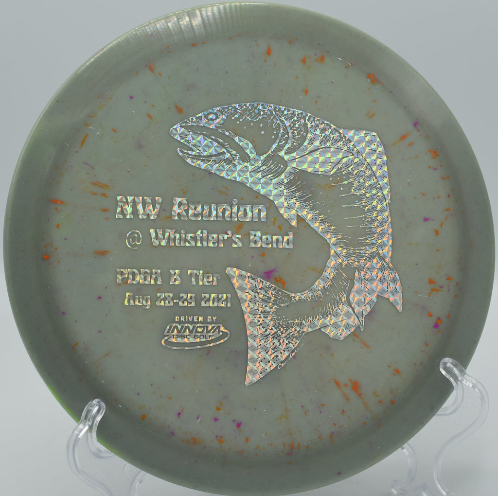 Splatter Star Firebird battling a headwind with a powerful fade on Hole 6 at Kincaid Park Disc Golf Course, Anchorage, Alaska.
