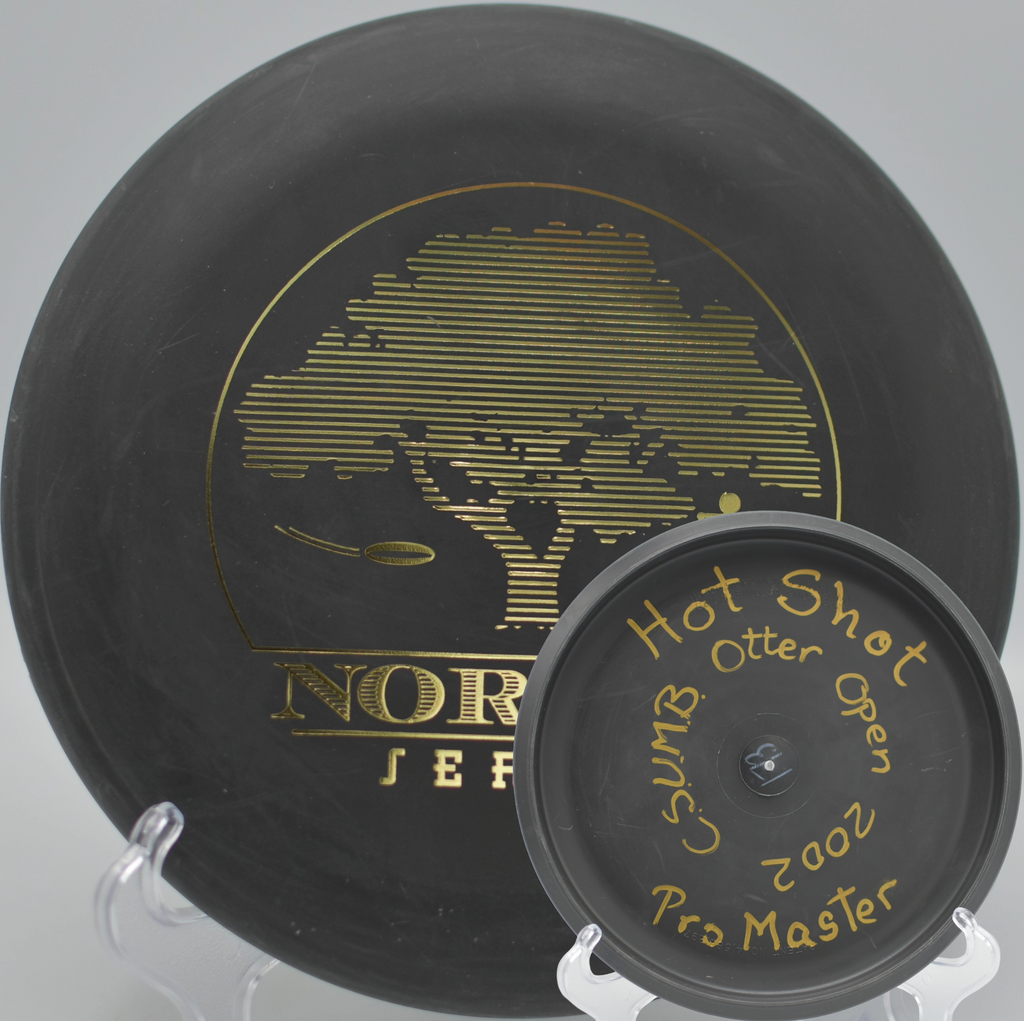 Black 2-Ring San Marino Microbead Aviar w/Pat# (NorCal Series 97–02) gliding through coastal fog at Humboldt State University Disc Golf Course in Arcata, California.