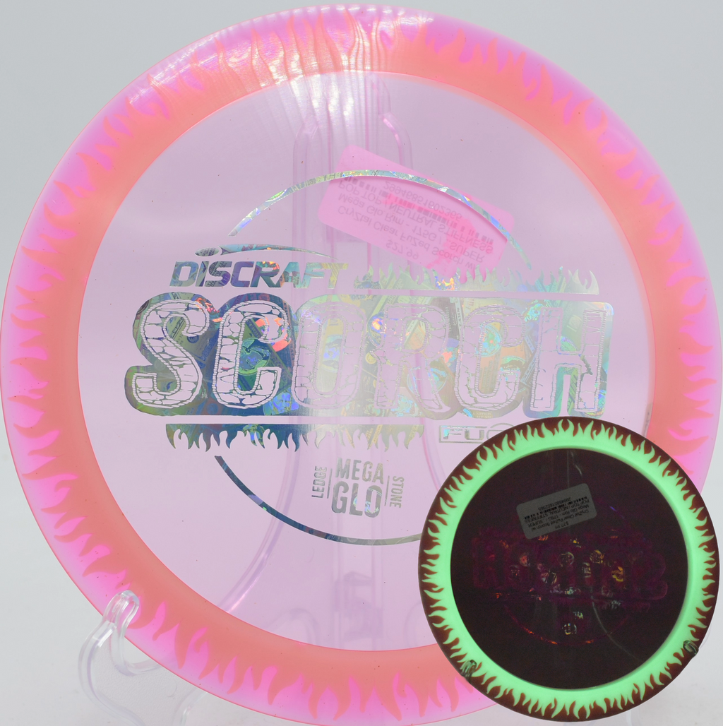 CryZtal Clear FuZed Scorch glowing bright during a twilight round at Maple Hill Disc Golf Course, MA