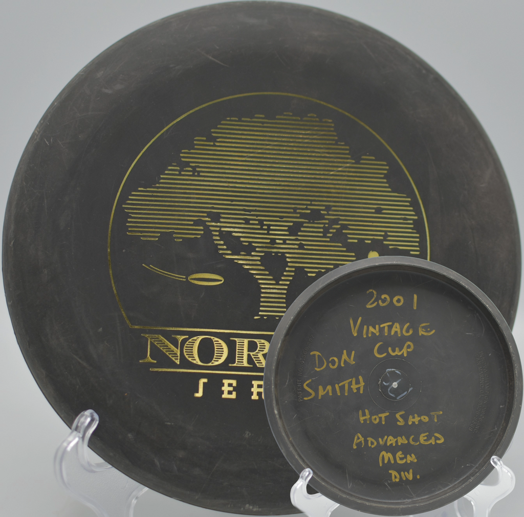 Black 2-Ring San Marino Microbead Aviar w/Pat# (NorCal Series 97–02) flying flat and straight at Crane Creek Regional Park Disc Golf Course in Rohnert Park, California.