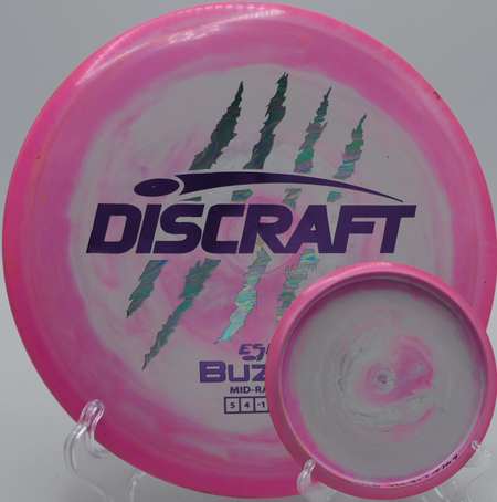 Paul McBeth’s 4 Claw Buzzz carving through a wooded par 3 at Lake Eureka in Eureka, Illinois.