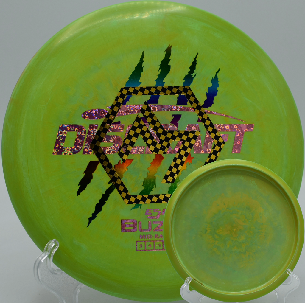 Discraft 4 Claw Buzzz holding a buttery turnover line at Blue Ribbon Pines in East Bethel, Minnesota.