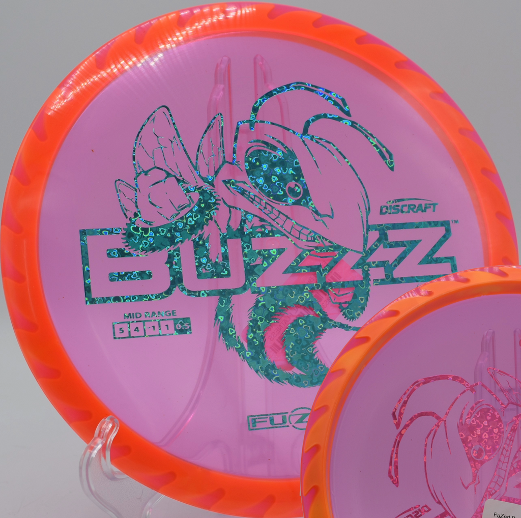 Fuzed plastic Buzzzsaw carving down a wooded lane at Jack Brooks Regional Park in Hitchcock, Texas, delivering powerful control midrange performance.

