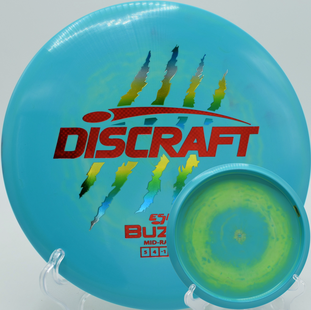 Iconic Discraft 4 Claw Buzzz gliding flat at Fountain Hills Disc Golf Course in Arizona.