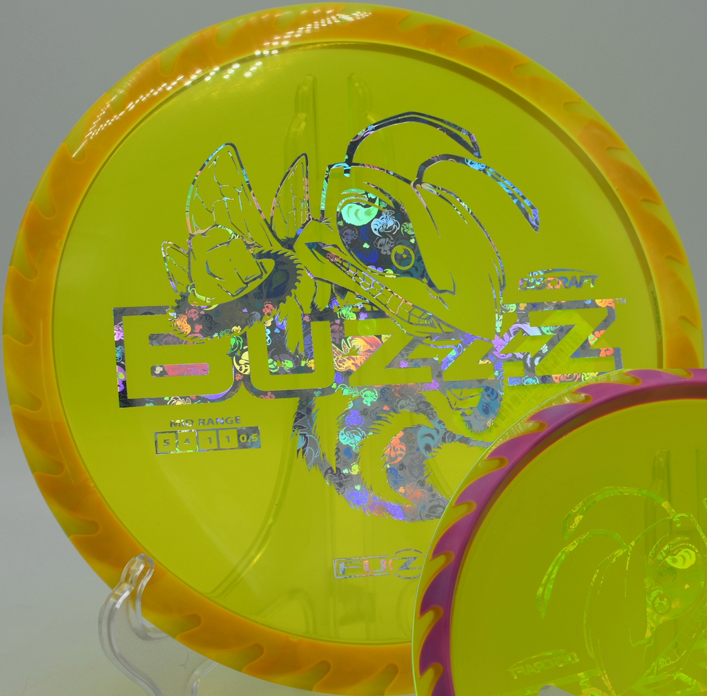 Discraft Fuzed Buzzzsaw in mid-flight at Harmon Park DGC in Lebanon, Oregon, gliding into a reliable fade for forehand approaches.


