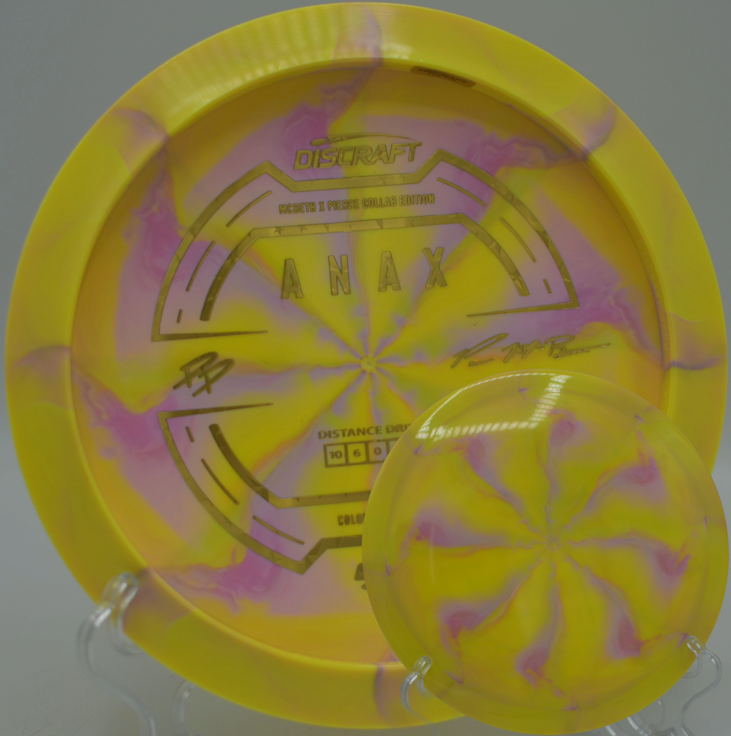 2025 Collab ESP Anax resting on a hillside fairway at Hornet’s Nest DGC in Charlotte, NC, showcasing its strong fade and stability.