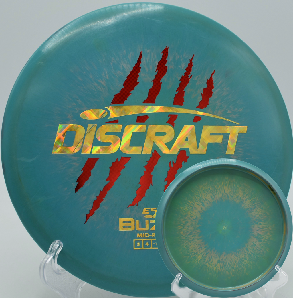 Discraft’s 4 Claw Buzzz holding a smooth turnover at Reservoir Park in Southern Pines, North Carolina.