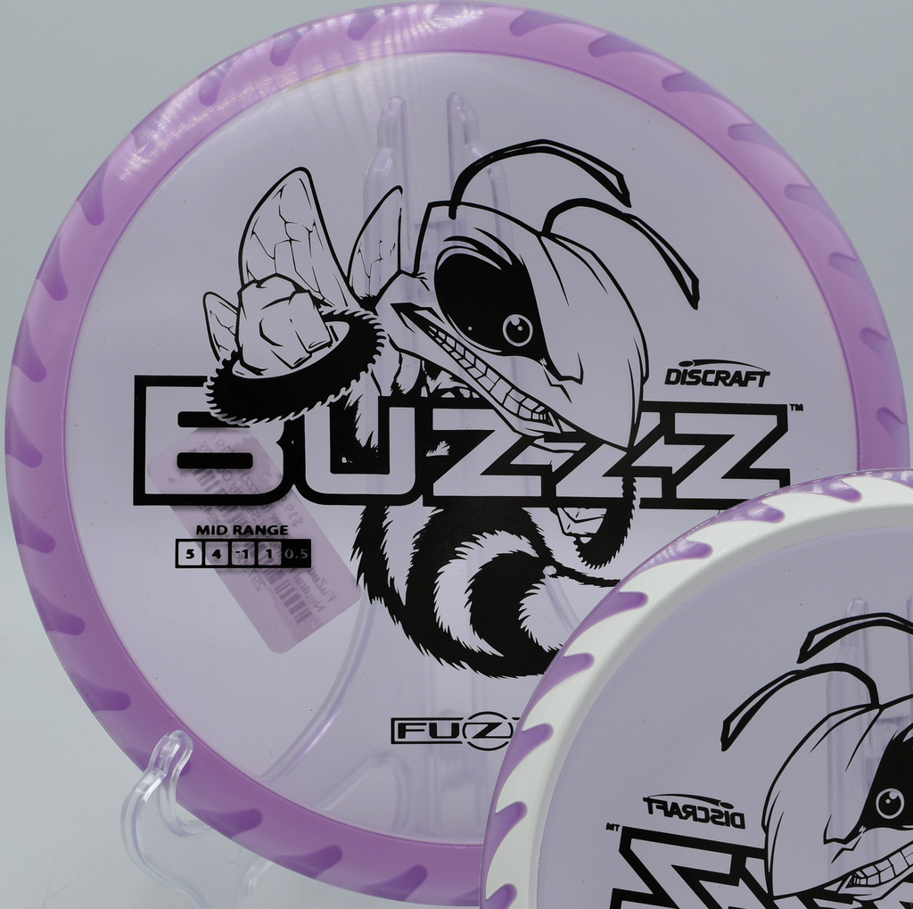 Fuzed Buzzzsaw grinding toward the basket with overstable fade at Maple Hill Disc Golf Course in Leicester, Massachusetts.

