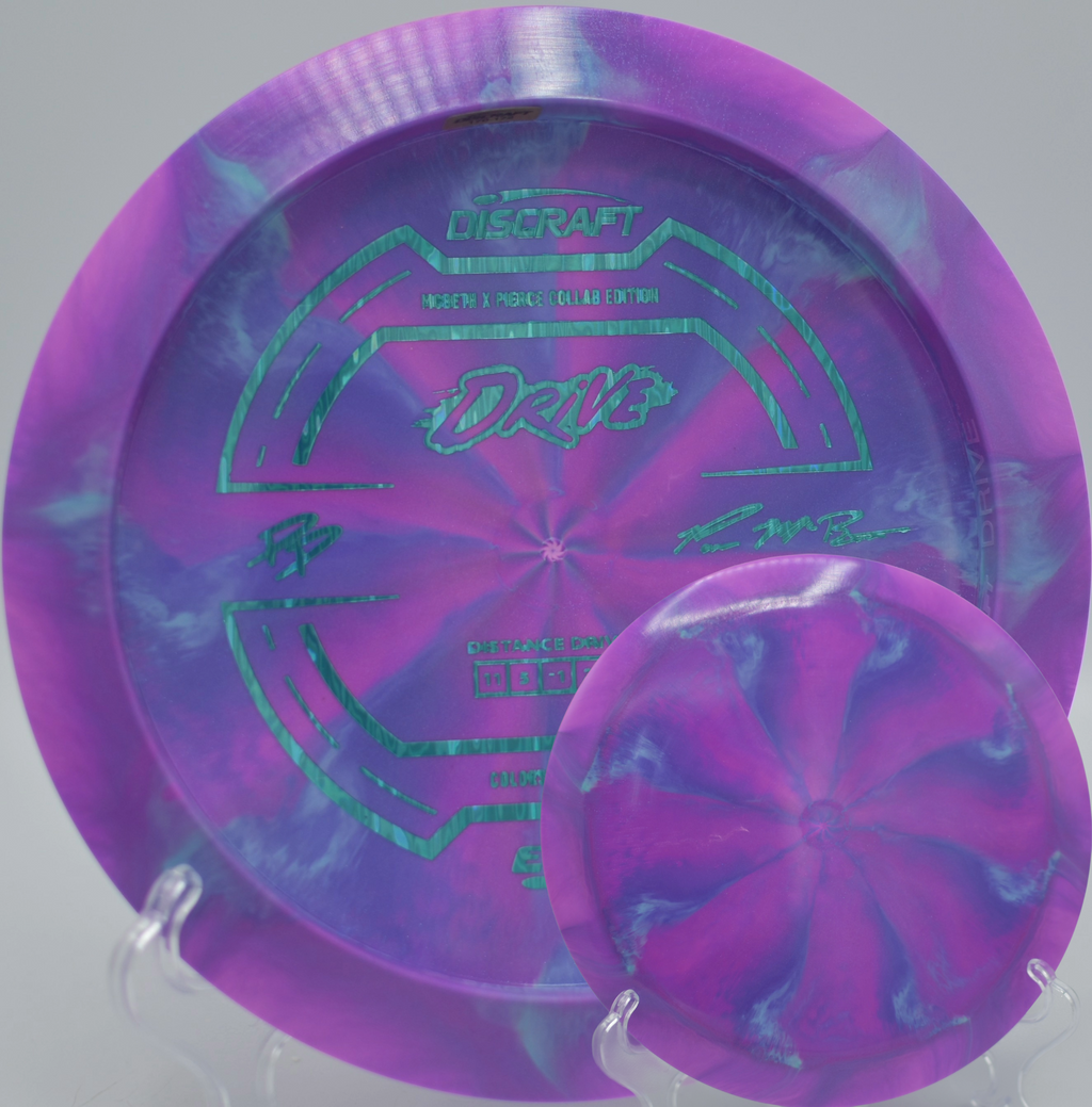 ESP Drive collaboration disc displayed on a hillside fairway at Milo McIver State Park DGC in Estacada, OR, built for max-distance carries.