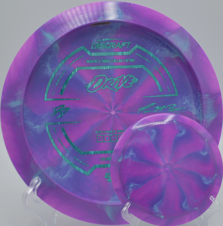 ESP Drive collaboration disc displayed on a hillside fairway at Milo McIver State Park DGC in Estacada, OR, built for max-distance carries.