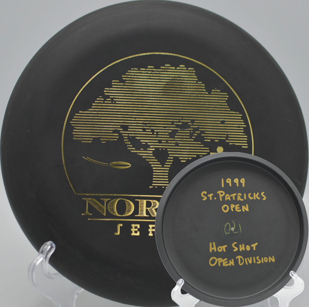 Black 2-Ring San Marino Microbead Aviar w/Pat# (NorCal Series 97–02) tapping in for birdie at Skyline Wilderness Park Disc Golf Course in Napa, California.