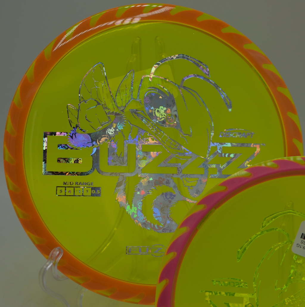 Fuzed Buzzzsaw flying cleanly over rolling hills at Orange Crush Disc Golf Course in Fairmont, West Virginia.