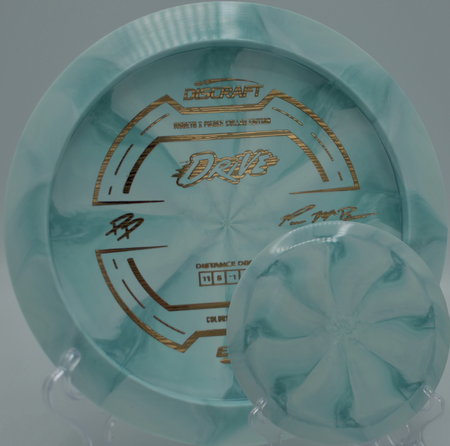 ESP Drive Paige Pierce & Paul McBeth collaboration staged on the fairway at Fountain Hills DGC in Fountain Hills, AZ, highlighting its glidey -1 turn.