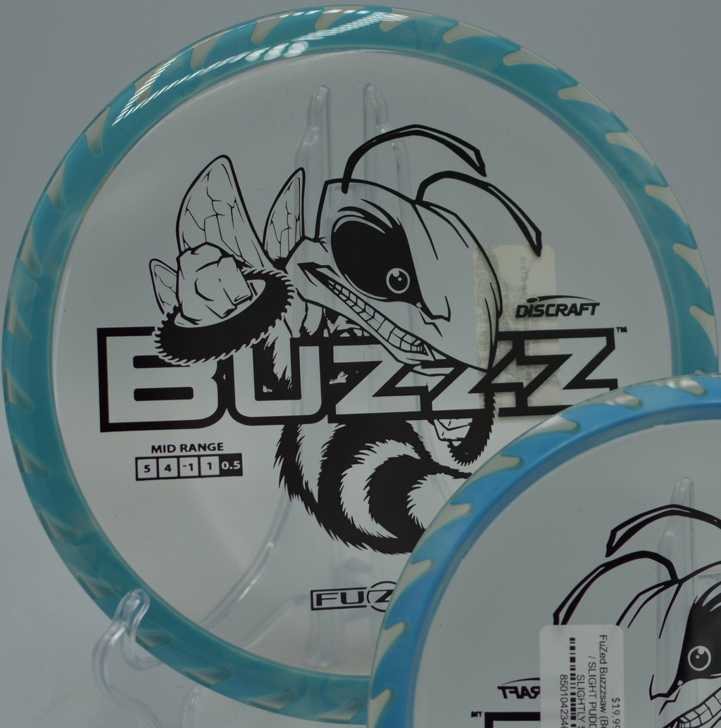 Discraft Fuzed Buzzzsaw slicing a controlled turnover line at Campgaw Mountain Disc Golf Course in Mahwah, New Jersey.