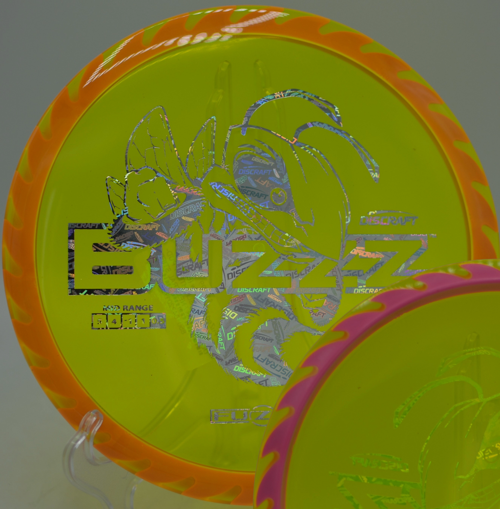 Fuzed Buzzzsaw carving through hardwood lines at Nevin Park Disc Golf Course in Charlotte, North Carolina.