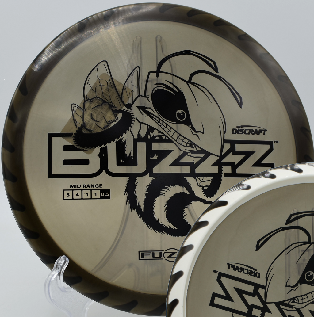 Fuzed Buzzzsaw buzzing through trees on a low line drive at SeaTac Disc Golf Course in Washington.

