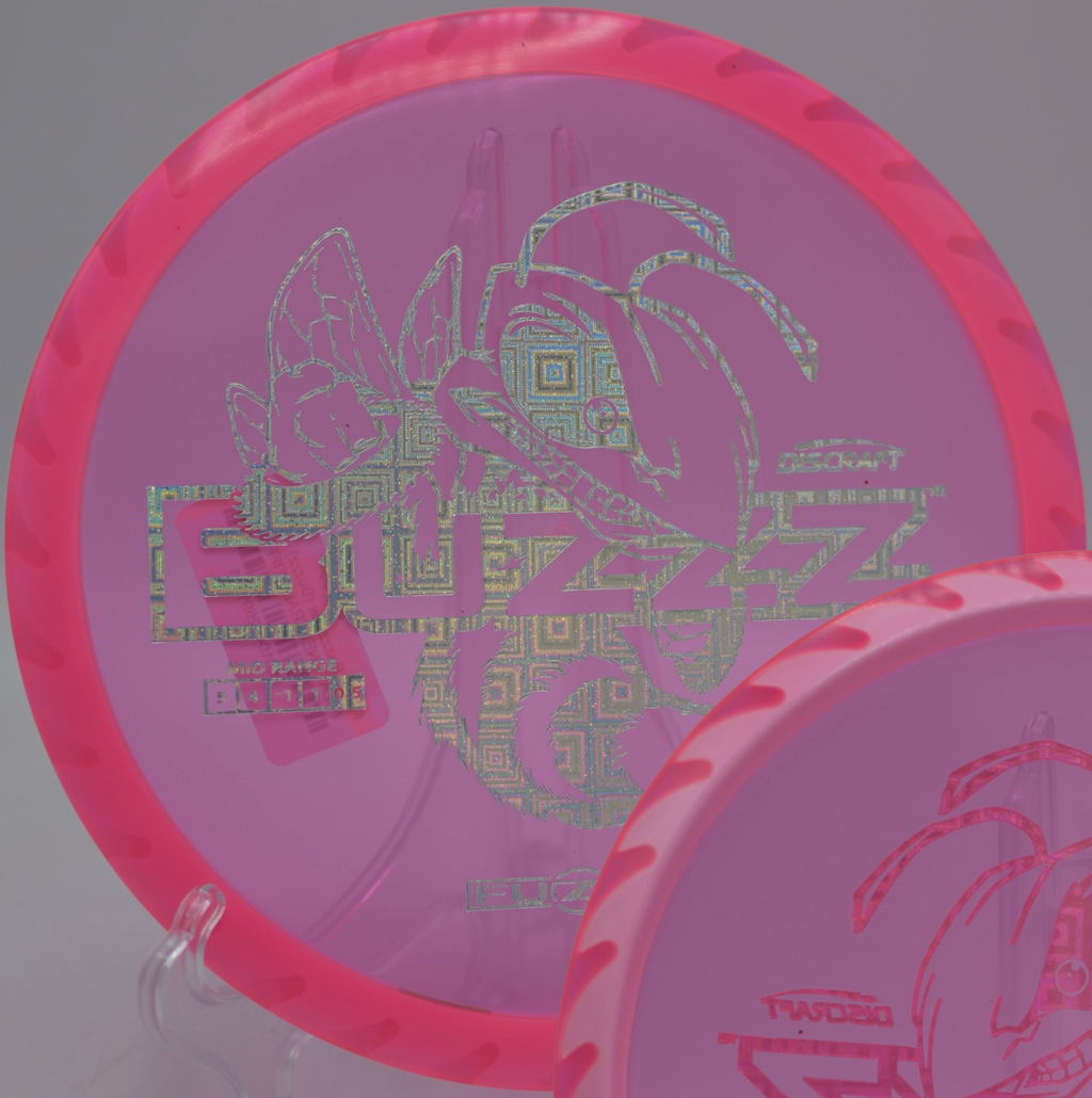 Player lining up a controlled midrange shot with the Fuzed Buzzzsaw at Wickham Park Disc Golf Course in Manchester, Connecticut.