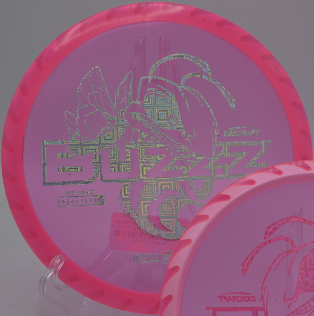 Discraft Fuzed Buzzzsaw ripping through a narrow wooded fairway at Crane Hill Disc Golf Course in Wilbraham, Massachusetts.