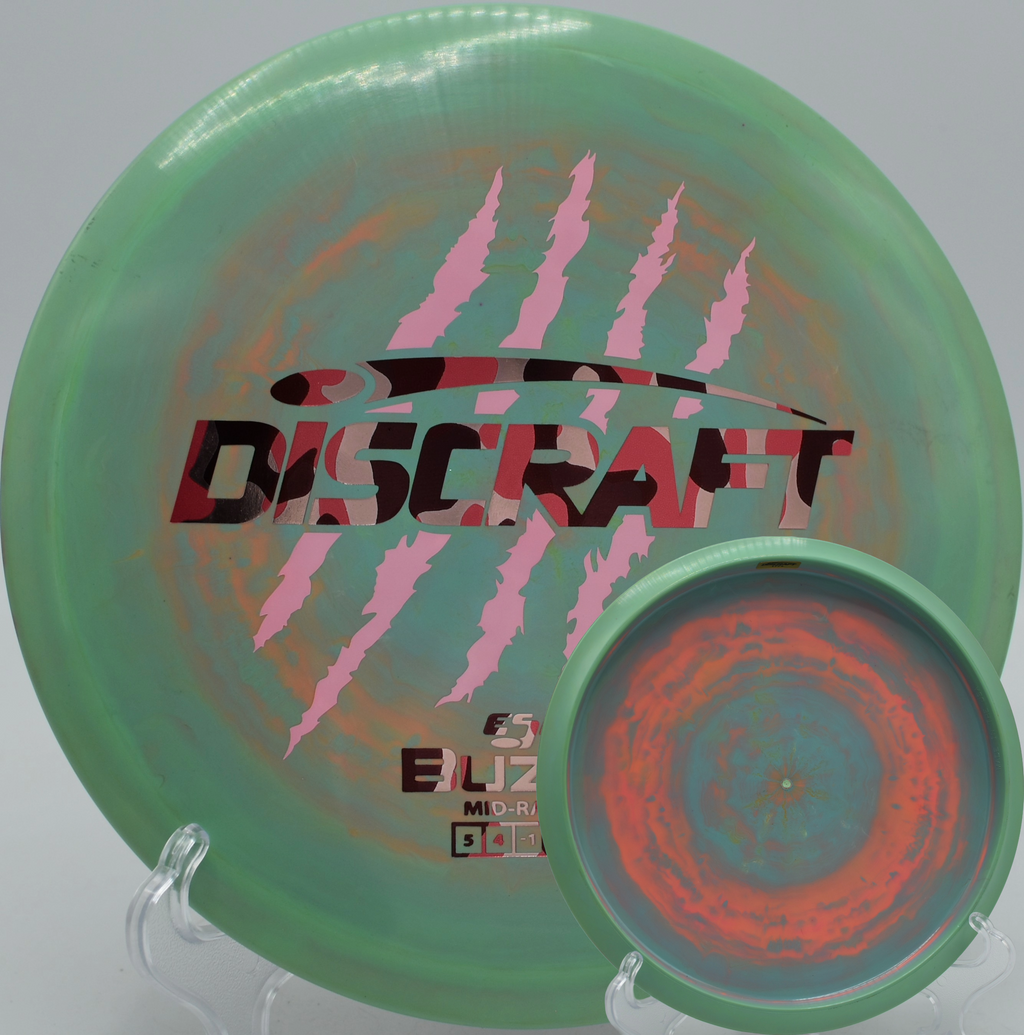 Controlled Buzzz 4 Claw turnover through the trees at Bear Mountain Disc Golf Course in Meade, Washington.