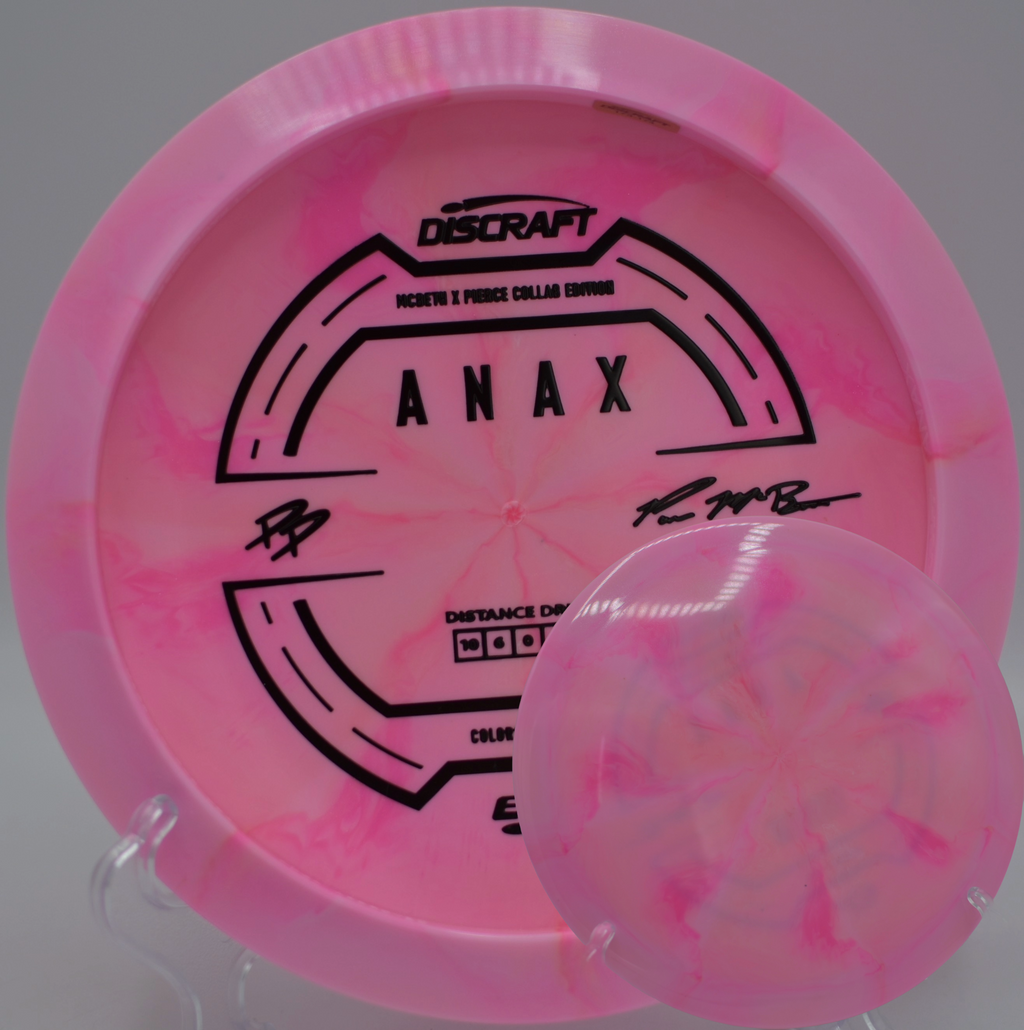 Special edition ESP Anax Collab resting in pine needles at Blue Ribbon Pines DGC in East Bethel, MN, built for torque-resistant backhand and forehand drives.