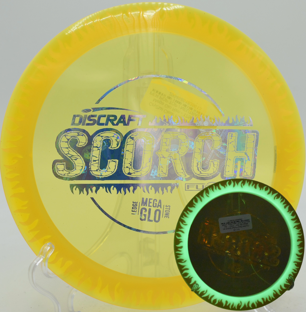 Mega Glo CryZtal FuZed Scorch mid-flight on a night drive at Cal Young Disc Golf Course, Eugene OR