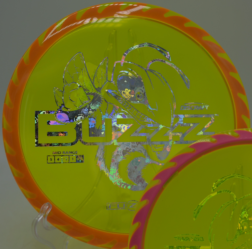 Fuzed Buzzzsaw flying flat and true through the trees at Tyler State Park Disc Golf Course in Newtown, Pennsylvania.