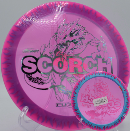 Flame-rimmed Discraft Scorchflame soaring over the fairway at DeLaveaga Disc Golf Course in Santa Cruz, California

