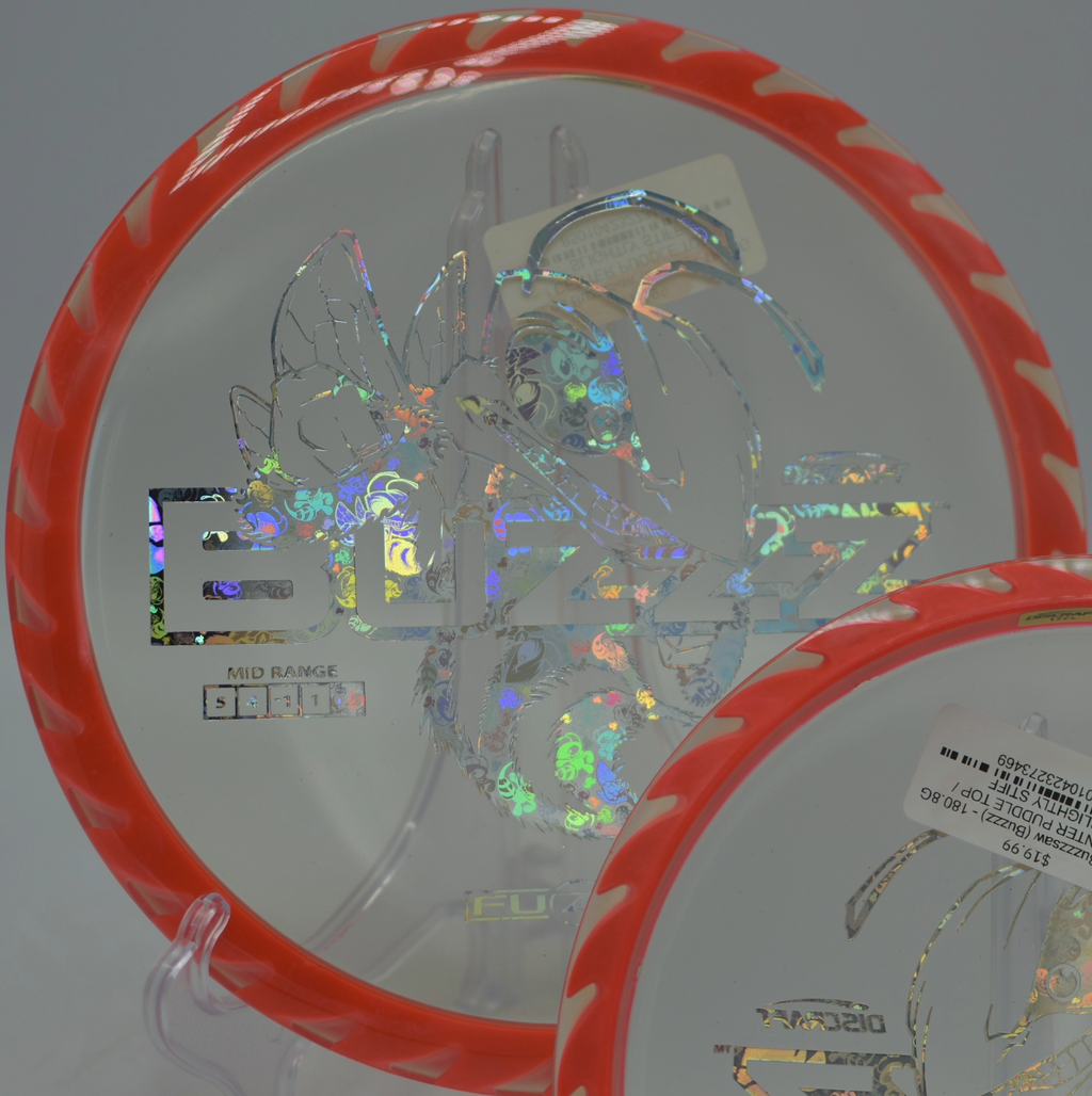 Player unleashing a flat-line drive with the Fuzed Buzzzsaw at Codorus State Park Disc Golf Course in Hanover, Pennsylvania.