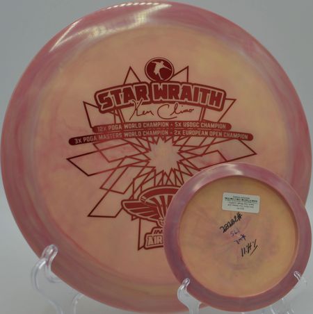 Ken Climo 22X Swirly Star Wraith (USED) launching a seasoned hyzer-flip at Lake Casitas DGC in Ventura, California, its worn-in flight offering extra turn and effortless glide.