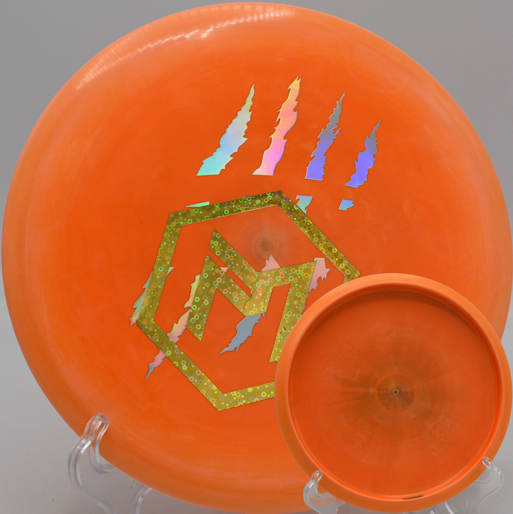 Paul McBeth 4 Claw Buzzz parked under the basket on a tunnel shot at Maple Hill Disc Golf Course in Leicester, Massachusetts.