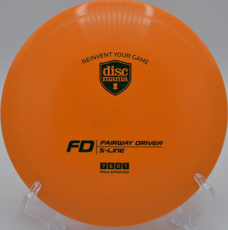 "S-Line FD disc golf fairway driver with high glide and precise control, captured mid-flight at Parc de la Glorieta Disc Golf Course in Tarragona, Spain."
